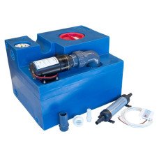 Wastewater tank with macerator