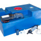 Wastewater tank with macerator
